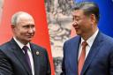 Chinese President Xi Jinping and Russian President Vladimir Putin in Beijing (Sergei Bobylev, Sputnik, Kremlin Pool Photo via AP)