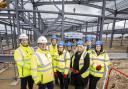 Representatives from Durham County Council, Kier, the North East Combined Authority, Ryder Architecture and Clear Futures were on site to watch as the last piece of steel was fitted for the new phase of the park’s development.